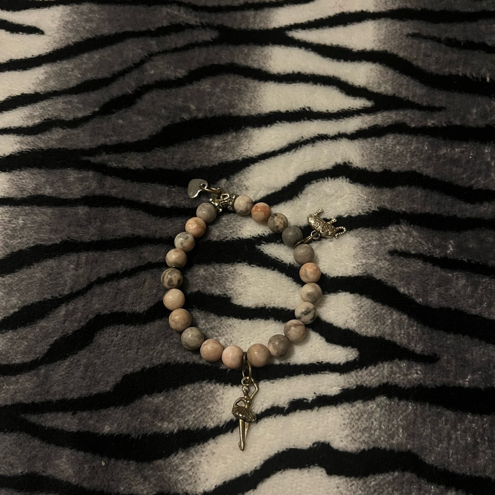 Elegant Beaded Bracelet with Charm